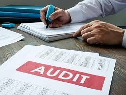 A person writing on papers

AI-generated content may be incorrect.